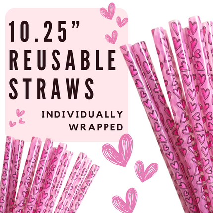a bunch of pink straws with hearts on them