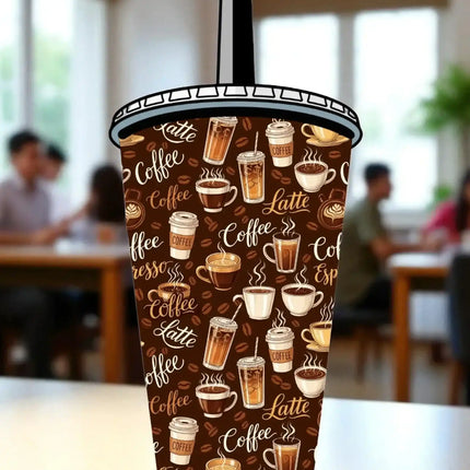 A coffee cup with a pattern of various coffee drinks on it, placed on a table in a cafe setting.