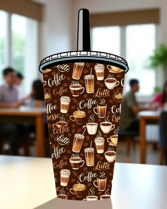 A coffee cup with a pattern of various coffee drinks on it, placed on a table in a cafe setting.