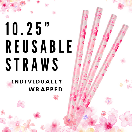 a bunch of pink straws sitting on top of a table