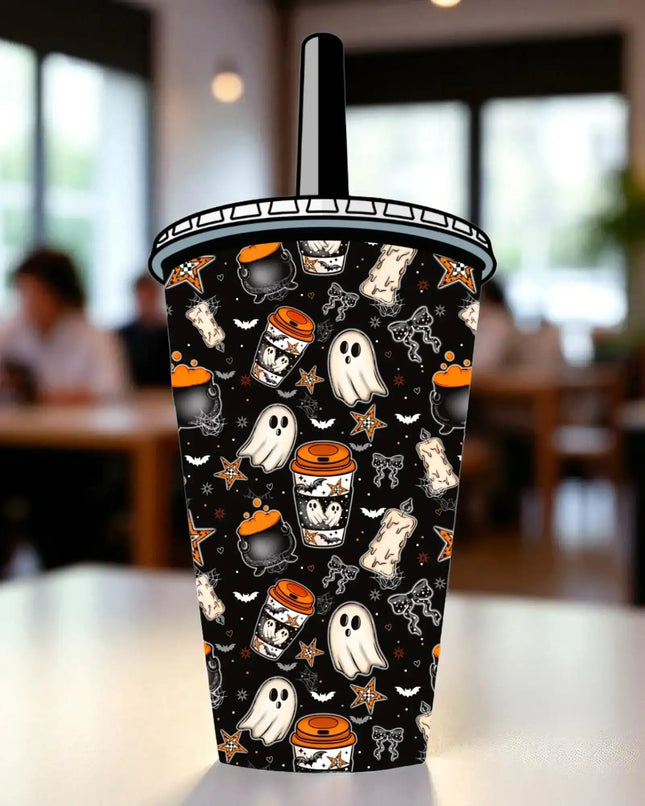 A Halloween-themed cup with a black background and various spooky and festive elements such as ghost, bats, stars, and a pumpkin.