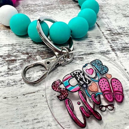 In Stock & Gorgeous 🩺 ~ Scrub Life Nurse Key Ring Bracelet - Sip Sleeves