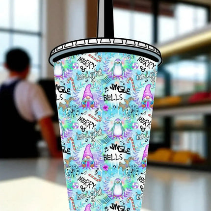 A colorful, patterned beverage cup with various Christmas-themed illustrations and text, including the words "Merry Bright" and "Jingle Bells".